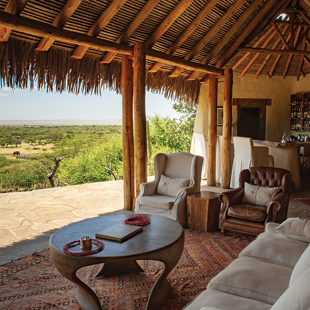 Living room of suite with view of Great Plains and wildlife