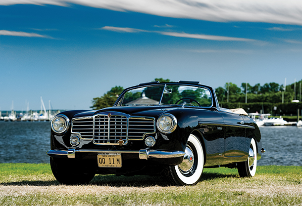 Front side view of a black 1948 Packard Victoria Convertible 